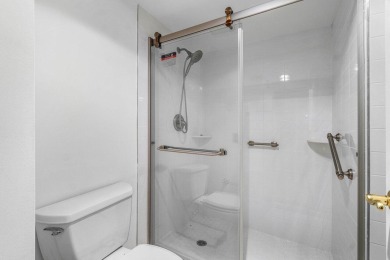 Welcome to this beautifully maintained first-floor corner condo on The Country Club At Boca Raton in Florida - for sale on GolfHomes.com, golf home, golf lot