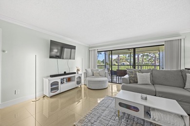 Welcome to 12926 Briarlake Dr #201 - a beautifully updated on Old Marsh Golf Club in Florida - for sale on GolfHomes.com, golf home, golf lot