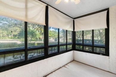 Welcome to this beautifully maintained first-floor corner condo on The Country Club At Boca Raton in Florida - for sale on GolfHomes.com, golf home, golf lot