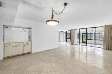 Welcome to this beautifully maintained first-floor corner condo on The Country Club At Boca Raton in Florida - for sale on GolfHomes.com, golf home, golf lot