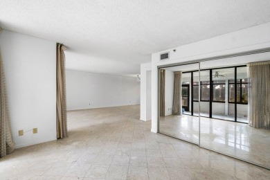 Welcome to this beautifully maintained first-floor corner condo on The Country Club At Boca Raton in Florida - for sale on GolfHomes.com, golf home, golf lot