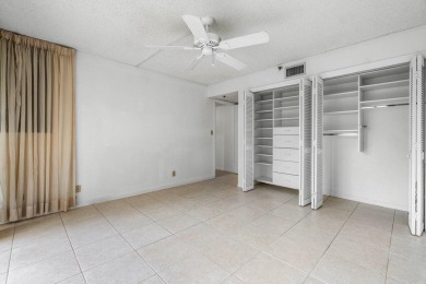 Welcome to this beautifully maintained first-floor corner condo on The Country Club At Boca Raton in Florida - for sale on GolfHomes.com, golf home, golf lot