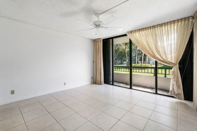 Welcome to this beautifully maintained first-floor corner condo on The Country Club At Boca Raton in Florida - for sale on GolfHomes.com, golf home, golf lot
