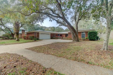 Electric updated!! Stunning 3-bedroom, 2.5-bath mid-century on Fort Walton Beach Golf Course in Florida - for sale on GolfHomes.com, golf home, golf lot