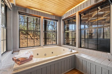 Discover a truly special mountain retreat offering breathtaking on Bent Creek Golf Course in Tennessee - for sale on GolfHomes.com, golf home, golf lot