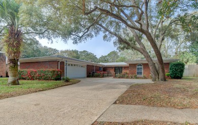 Electric updated!! Stunning 3-bedroom, 2.5-bath mid-century on Fort Walton Beach Golf Course in Florida - for sale on GolfHomes.com, golf home, golf lot