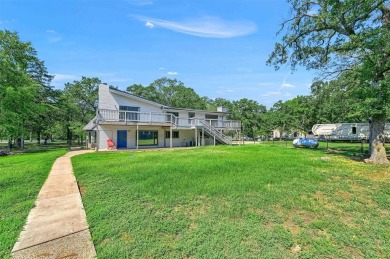 Large family home on beautiful, secluded, and heavily treed lot on Lake Kiowa Golf Course in Texas - for sale on GolfHomes.com, golf home, golf lot