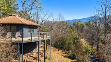 Discover a truly special mountain retreat offering breathtaking on Bent Creek Golf Course in Tennessee - for sale on GolfHomes.com, golf home, golf lot
