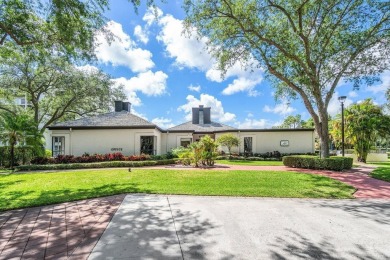 Welcome to this beautifully maintained first-floor corner condo on The Country Club At Boca Raton in Florida - for sale on GolfHomes.com, golf home, golf lot