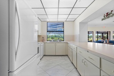 Welcome to this beautifully maintained first-floor corner condo on The Country Club At Boca Raton in Florida - for sale on GolfHomes.com, golf home, golf lot