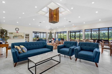 Welcome to this beautifully maintained first-floor corner condo on The Country Club At Boca Raton in Florida - for sale on GolfHomes.com, golf home, golf lot