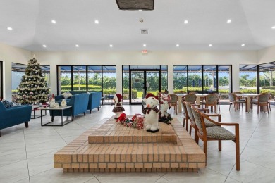 Welcome to this beautifully maintained first-floor corner condo on The Country Club At Boca Raton in Florida - for sale on GolfHomes.com, golf home, golf lot
