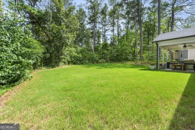 This lovely custom-built home offers a flowing, spacious on Fairfield Plantation Golf and Country Club in Georgia - for sale on GolfHomes.com, golf home, golf lot