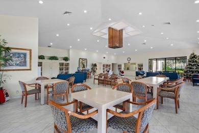 Welcome to this beautifully maintained first-floor corner condo on The Country Club At Boca Raton in Florida - for sale on GolfHomes.com, golf home, golf lot
