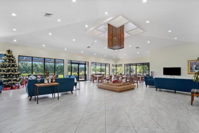 Welcome to this beautifully maintained first-floor corner condo on The Country Club At Boca Raton in Florida - for sale on GolfHomes.com, golf home, golf lot