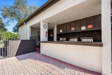 Welcome to this beautifully maintained first-floor corner condo on The Country Club At Boca Raton in Florida - for sale on GolfHomes.com, golf home, golf lot