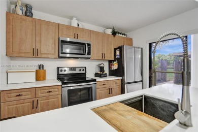 Come view this stunning 3 bedroom 2 1/2 bathroom updated on Pine Island Ridge Country Club in Florida - for sale on GolfHomes.com, golf home, golf lot