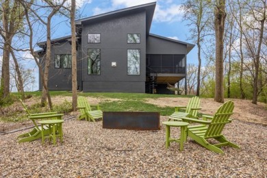 Escape to your own private paradise nestled in a tranquil wooded on Hyperion Field Club in Iowa - for sale on GolfHomes.com, golf home, golf lot