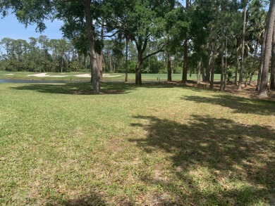 Ready to build, cleared, extra long lot in 24/7 guard gated on Plantation Bay Golf and Country Club in Florida - for sale on GolfHomes.com, golf home, golf lot