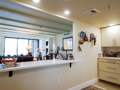 Welcome to The Envoy, where refined luxury meets resort-style on The President Country Club in Florida - for sale on GolfHomes.com, golf home, golf lot