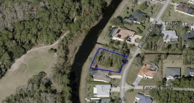Under contract-accepting backup offers. Oversized, freshwater on The Grand Club Cypress Course in Florida - for sale on GolfHomes.com, golf home, golf lot