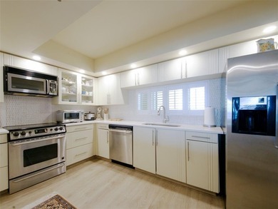 Welcome to The Envoy, where refined luxury meets resort-style on The President Country Club in Florida - for sale on GolfHomes.com, golf home, golf lot