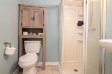 This dollhouse in Broadmoor features a charming kitchen and a on Querbes Park Golf Course in Louisiana - for sale on GolfHomes.com, golf home, golf lot