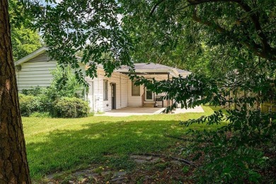 This dollhouse in Broadmoor features a charming kitchen and a on Querbes Park Golf Course in Louisiana - for sale on GolfHomes.com, golf home, golf lot