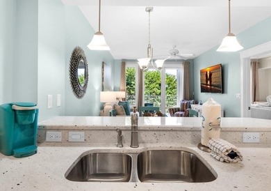 Located in the heart of Baytowne Wharf, this turnkey 5th-floor on Sandestin Golf and Beach Resort - Raven in Florida - for sale on GolfHomes.com, golf home, golf lot