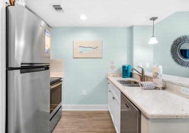 Located in the heart of Baytowne Wharf, this turnkey 5th-floor on Sandestin Golf and Beach Resort - Raven in Florida - for sale on GolfHomes.com, golf home, golf lot