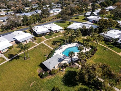 One or more photo(s) has been virtually staged. BIG PRICE DROP on Village Green Golf Club of Sarasota in Florida - for sale on GolfHomes.com, golf home, golf lot