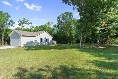 Beautiful 2-year-old home in the gated Linn Valley Lakes on Linn Valley Lakes - Deer Trace Golf Course in Kansas - for sale on GolfHomes.com, golf home, golf lot