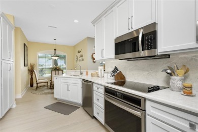 This exquisite Bristol home awaits your arrival. This Move-in on Kings Gate Golf Club in Florida - for sale on GolfHomes.com, golf home, golf lot