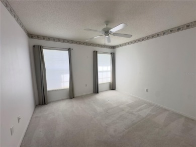 Move-in ready two-bedroom, two-bath home offering an open floor on Heritage Pines Country Club in Florida - for sale on GolfHomes.com, golf home, golf lot