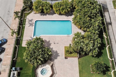 Wake up to treetop views and end your day with a stroll to on Granada Golf Club in Florida - for sale on GolfHomes.com, golf home, golf lot