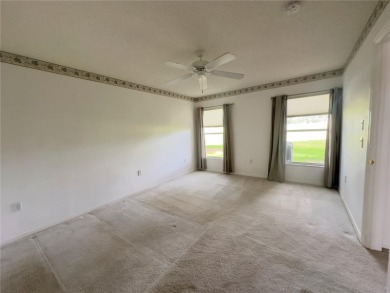 Move-in ready two-bedroom, two-bath home offering an open floor on Heritage Pines Country Club in Florida - for sale on GolfHomes.com, golf home, golf lot