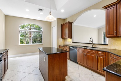PRICED TO SELL WITH A NEW ROOF! WELCOME TO YOUR SANCTUARY IN THE on PGA National Estates Golf Course in Florida - for sale on GolfHomes.com, golf home, golf lot