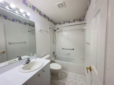 Move-in ready two-bedroom, two-bath home offering an open floor on Heritage Pines Country Club in Florida - for sale on GolfHomes.com, golf home, golf lot