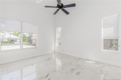 NEW ROOF! Welcome home to your 3 bedroom, 3.5 bath and 3 car on Santa Lucia River Club in Florida - for sale on GolfHomes.com, golf home, golf lot