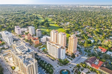 Wake up to treetop views and end your day with a stroll to on Granada Golf Club in Florida - for sale on GolfHomes.com, golf home, golf lot