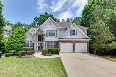 Spacious home nestled in the sought-after Bridgemill community on Bridgemill Golf Club in Georgia - for sale on GolfHomes.com, golf home, golf lot