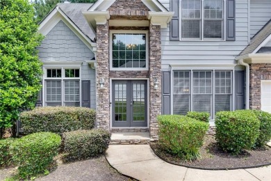 Spacious home nestled in the sought-after Bridgemill community on Bridgemill Golf Club in Georgia - for sale on GolfHomes.com, golf home, golf lot