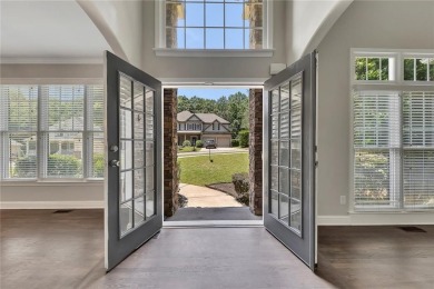 Spacious home nestled in the sought-after Bridgemill community on Bridgemill Golf Club in Georgia - for sale on GolfHomes.com, golf home, golf lot