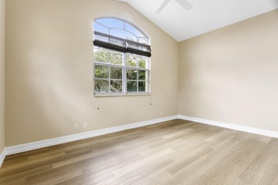 PRICED TO SELL WITH A NEW ROOF! WELCOME TO YOUR SANCTUARY IN THE on PGA National Estates Golf Course in Florida - for sale on GolfHomes.com, golf home, golf lot