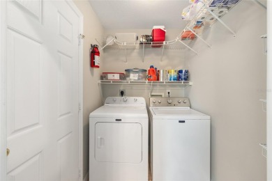 You'll love this beautiful, concrete block stucco home with so on Royal Oaks Golf Club in Florida - for sale on GolfHomes.com, golf home, golf lot