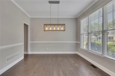 Spacious home nestled in the sought-after Bridgemill community on Bridgemill Golf Club in Georgia - for sale on GolfHomes.com, golf home, golf lot