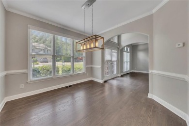 Spacious home nestled in the sought-after Bridgemill community on Bridgemill Golf Club in Georgia - for sale on GolfHomes.com, golf home, golf lot
