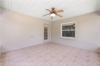 You'll love this beautiful, concrete block stucco home with so on Royal Oaks Golf Club in Florida - for sale on GolfHomes.com, golf home, golf lot
