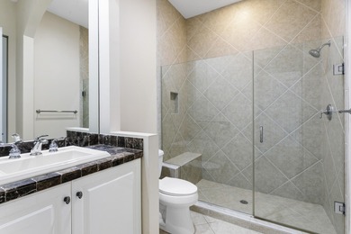 PRICED TO SELL WITH A NEW ROOF! WELCOME TO YOUR SANCTUARY IN THE on PGA National Estates Golf Course in Florida - for sale on GolfHomes.com, golf home, golf lot