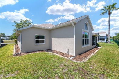 You'll love this beautiful, concrete block stucco home with so on Royal Oaks Golf Club in Florida - for sale on GolfHomes.com, golf home, golf lot
